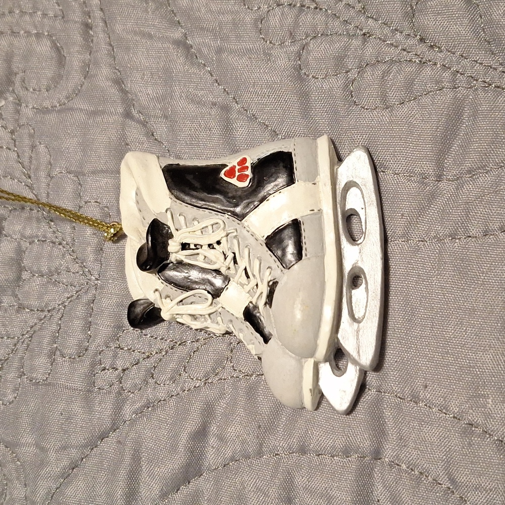 Ceramic hockey skates ornament.